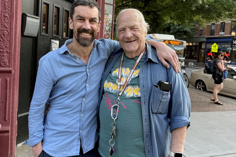 Colin Murphy with ‘Moe the Lib’ outside Farrell’s Bar in Brooklyn. Photo: Michael Quinn